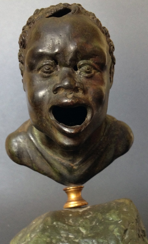 A Renaissance Bronze Oil Lamp after a Roman Head of a Nubian